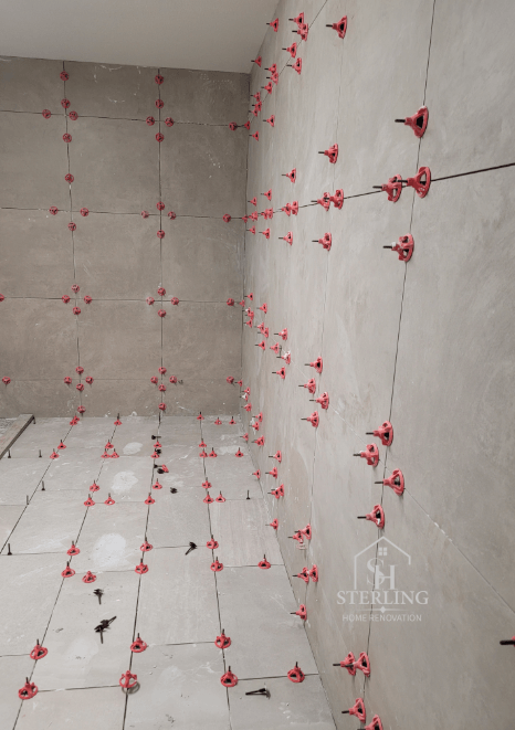 Bathroom tile installation in progress
