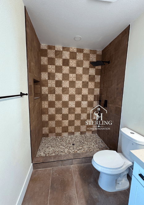 Bathroom tile installation in progress